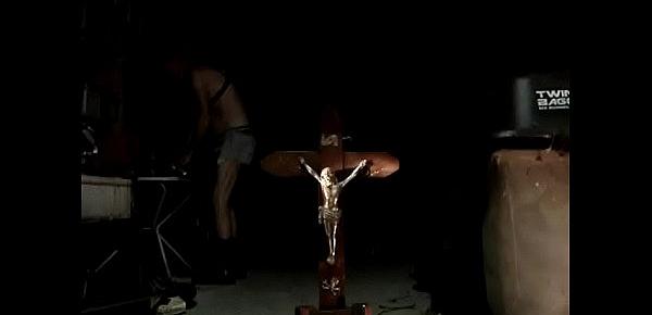  666 BLASPHEMIC PISS ALL OVER FUCKING CRUCIFIX IN SEXY USED JEANSSHORT, BLACK SPANDEX STRING AND BOOTS. SMOKING